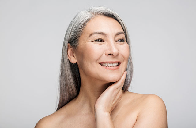Woman smiling after using Skybright Colloidal Silver Cream.