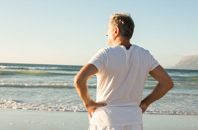 Man looking out at ocean