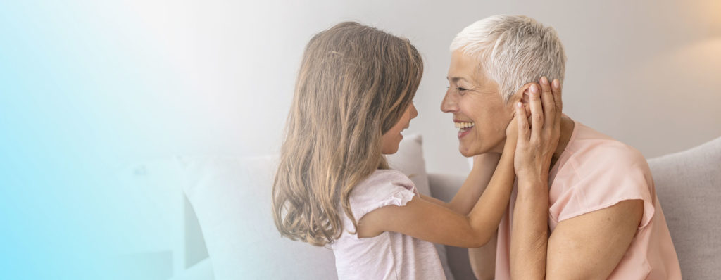 Woman with grand-daughter.